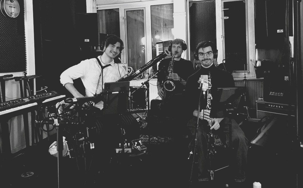 Multi-track recording session and custom horn and string arrangement services for musicians.